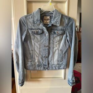 Distressed light denim jacket